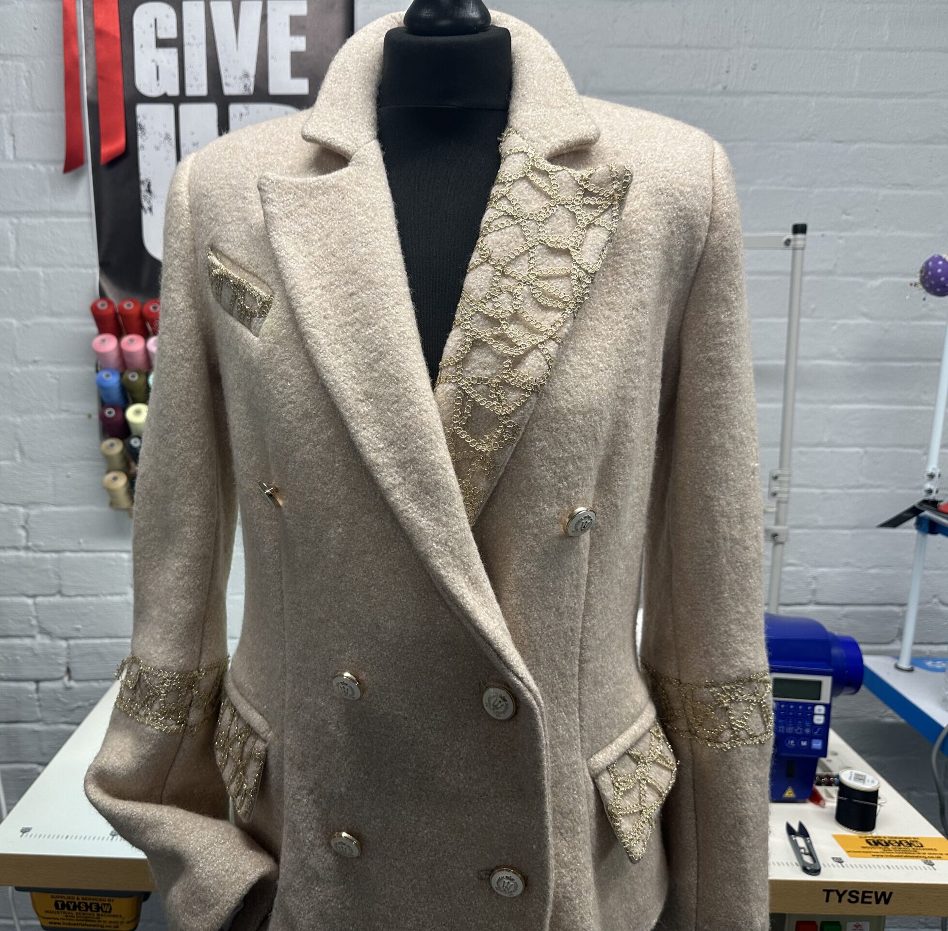 bespoke double-breasted womens coat in beige wool, four buttons, made by k&k couture studio