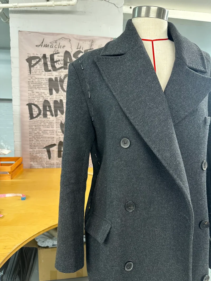 tailored bespoke double-breasted coat by K&K Couture