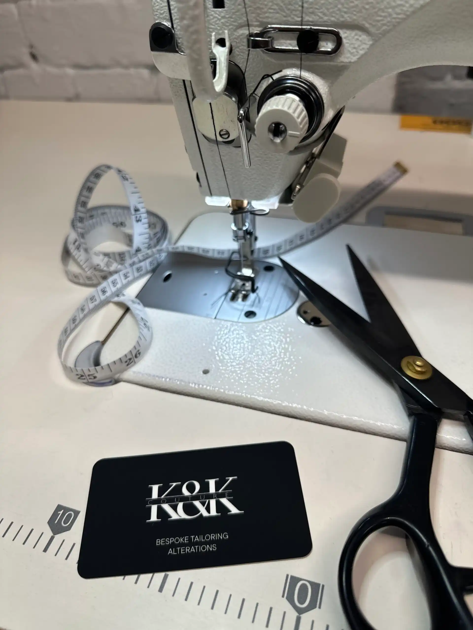 Express Alterations: A tailor performing a rapid alteration on a jacket in London